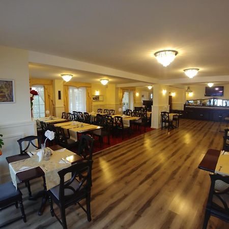Hotel Mazurski Dworek Mikołajki Bagian luar foto